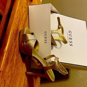 Size 6.5 Guess glitzy gold sandal.
